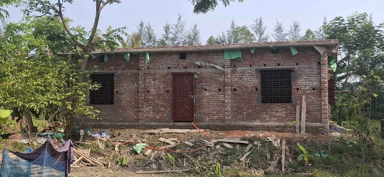 নোয়াখালীতে আদালতের আদেশ অমান্য করে বিএনপি নেতার পাকা দালান নির্মাণ
